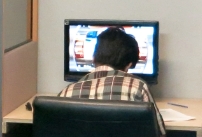 photo of guard taking online training course